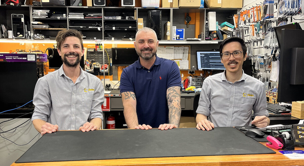 The PC Choice team — Patrick, Haider, and James in the Wynnum Plaza workshop
